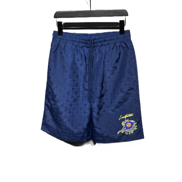 Short de Plage à Motif MONOGRAM et Visages LOUIS VUITTON x YK 2023 | Collection Printemps/Été – Collaboration Artistique Vibrante