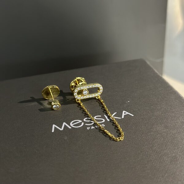 Boucles d’oreilles asymétriques à diamant mobile Messika