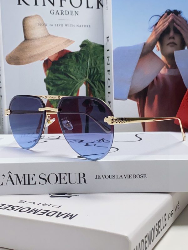 Cartier – Lunettes de Soleil Ronde Signature, Élégance Unisexe et Légèreté Absolue